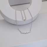 0.56 Ct Lab Grown Round Diamond White Gold Charm Pendant